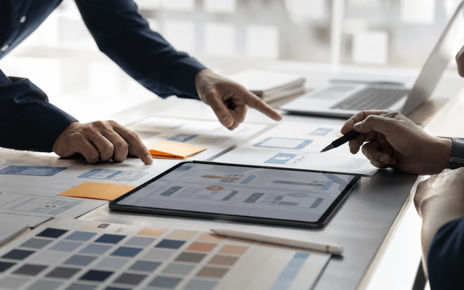 UX and UI design workshop with prototype screens, journey maps, and color swatches